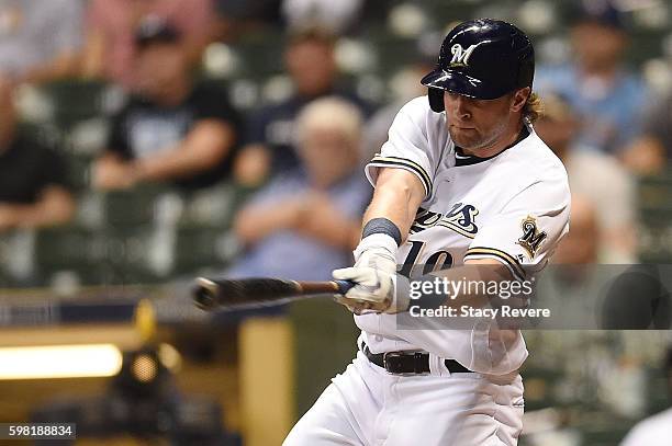 Kirk Nieuwenhuis of the Milwaukee Brewers swings at a pitch during the eighth inning of a game against the St. Louis Cardinals at Miller Park on...