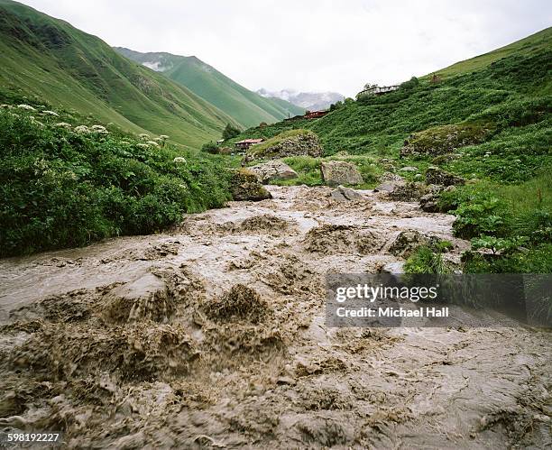 flooded river, topsoil loss - erosion foto e immagini stock