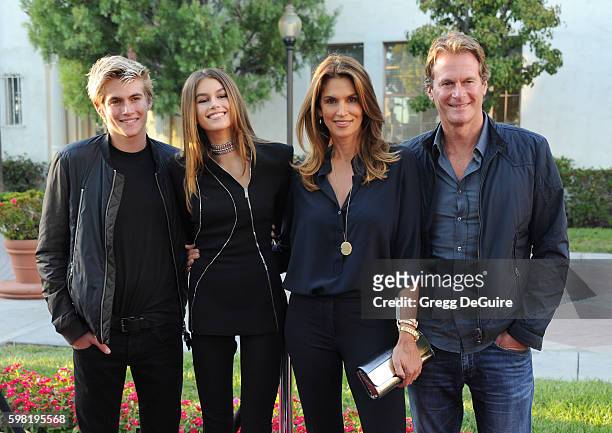 Presley Gerber, Kaia Gerber, Cindy Crawford and husband Rande Gerber arrive at the premiere of Lifetime's "Sister Cities" at Paramount Theatre on...