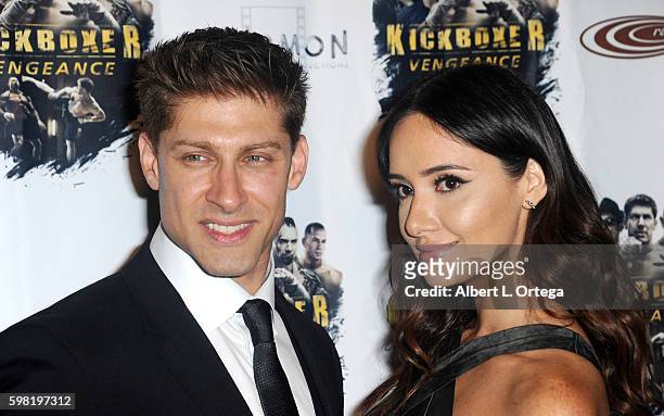 Actor Alain Moussi and actress Sara Malakul Lane arrive for the Premiere Of RLJ Entertainment's "Kickboxer: Vengeance" held at iPic Theaters on...