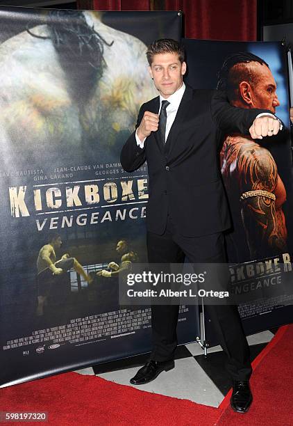 Actor Alain Moussi arrives for the Premiere Of RLJ Entertainment's "Kickboxer: Vengeance" held at iPic Theaters on August 31, 2016 in Los Angeles,...