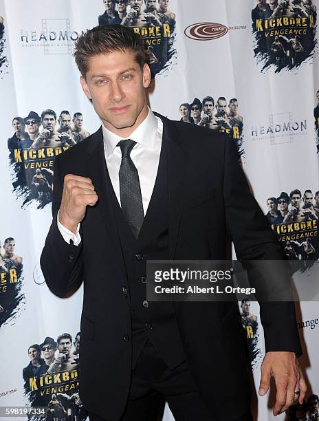 Actor Alain Moussi arrives for the Premiere Of RLJ Entertainment's "Kickboxer: Vengeance" held at iPic Theaters on August 31, 2016 in Los Angeles,...