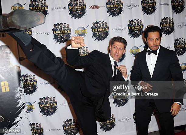 Actors/fighters Sam Medina and Alain Moussi at the Premiere Of RLJ Entertainment's "Kickboxer: Vengeance" held at iPic Theaters on August 31, 2016 in...