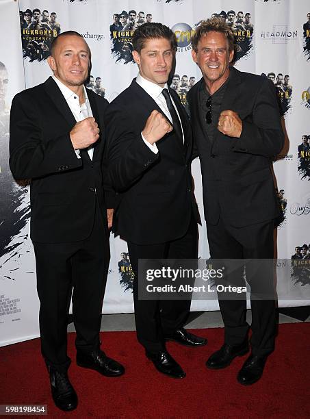 Actors Georges St-Pierre, Alain Moussi and Michael Dudikoff arrive for the Premiere Of RLJ Entertainment's "Kickboxer: Vengeance" held at iPic...