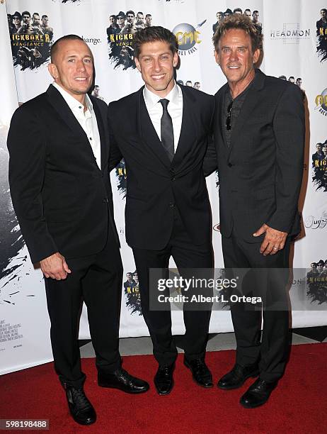 Actors Georges St-Pierre, Alain Moussi and Michael Dudikoff arrive for the Premiere Of RLJ Entertainment's "Kickboxer: Vengeance" held at iPic...