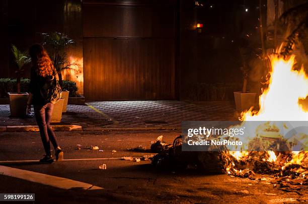 Actiivists build makeshifts barricades with garbage during protest in Sao Paulo, Brazil on 31 August 2016 against the impeachment of Dilma Rousseff...