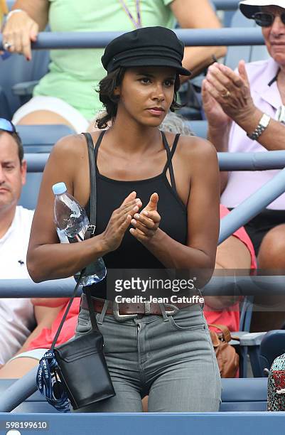 Shy'm attends the defeat of Benoit Paire of France in 4 sets in the second round on day 3 of the 2016 US Open at USTA Billie Jean King National...