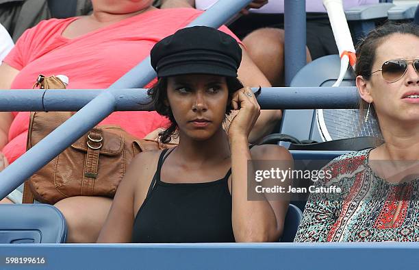 Shy'm attends the defeat of Benoit Paire of France in 4 sets in the second round on day 3 of the 2016 US Open at USTA Billie Jean King National...