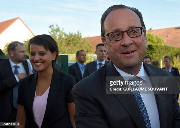 French President Francois Hollande and French Minister of Education Najat Vallaud-Belkacem arrive for a visit of the primary school Nécotin and the...