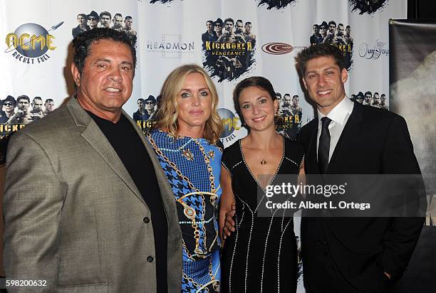 Producer/writer Dimitri Logothetis Janie Des Rosiers and fighter/actor Alain Moussi arrive for the Premiere Of RLJ Entertainment's "Kickboxer:...