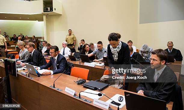 Lead defendant Beate Zschaepe , her lawyer Mathias Grasel and co-defendants Ralf Wohlleben , Andre E. , Holger G. And Carsten S. Wait for the start...