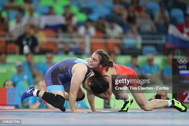 Day 12 Sara Dosho of Japan in action during her gold medal win against Natalia Vorobeva of Russia during their Women's Freestyle 69 kg Gold Medal...