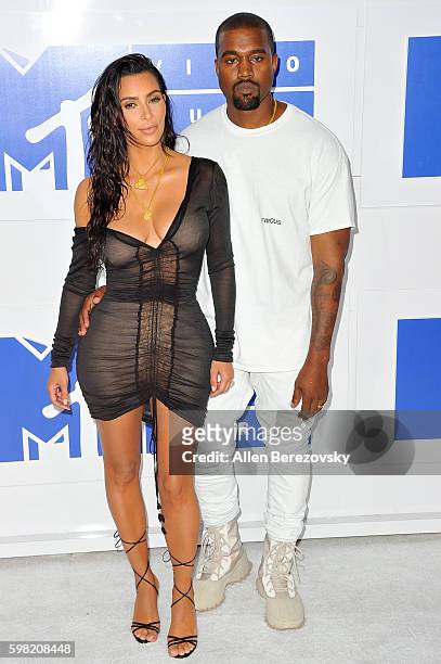 Personality Kim Kardashian West and recording artist Kanye West arrive at the 2016 MTV Video Music Awards at Madison Square Garden on August 28, 2016...