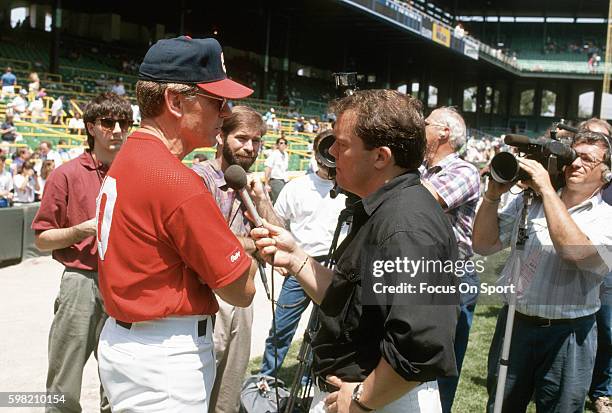 Manager Jeff Torborg of the Chicago White Sox talks with the media prior to the start of a Major League Baseball game circa 1990 at Comiskey Park in...
