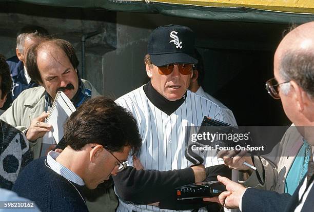 Manager Jeff Torborg of the Chicago White Sox talks with the media prior to the start of a Major League Baseball game circa 1991 at Comiskey Park in...