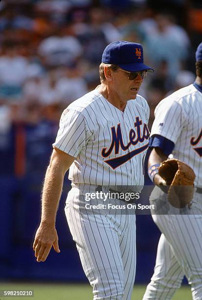 Manager Jeff Torborg of the New York Mets walks off the field after arguing with an umpire during an Major League Baseball game circa 1993 at Shea...