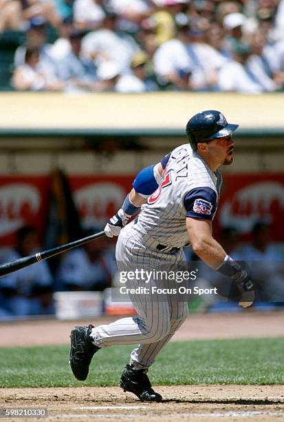 Jim Leyritz of the Anaheim Angels bats against the Oakland Athletics during an Major League Baseball game circa 1997 at the Oakland-Alameda County...