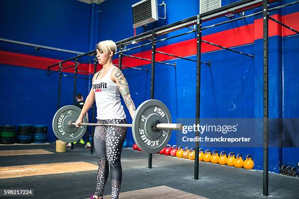 Strong Training Woman Doing A Strong Training Gym Weightlifting High-Res Stock Photo ...