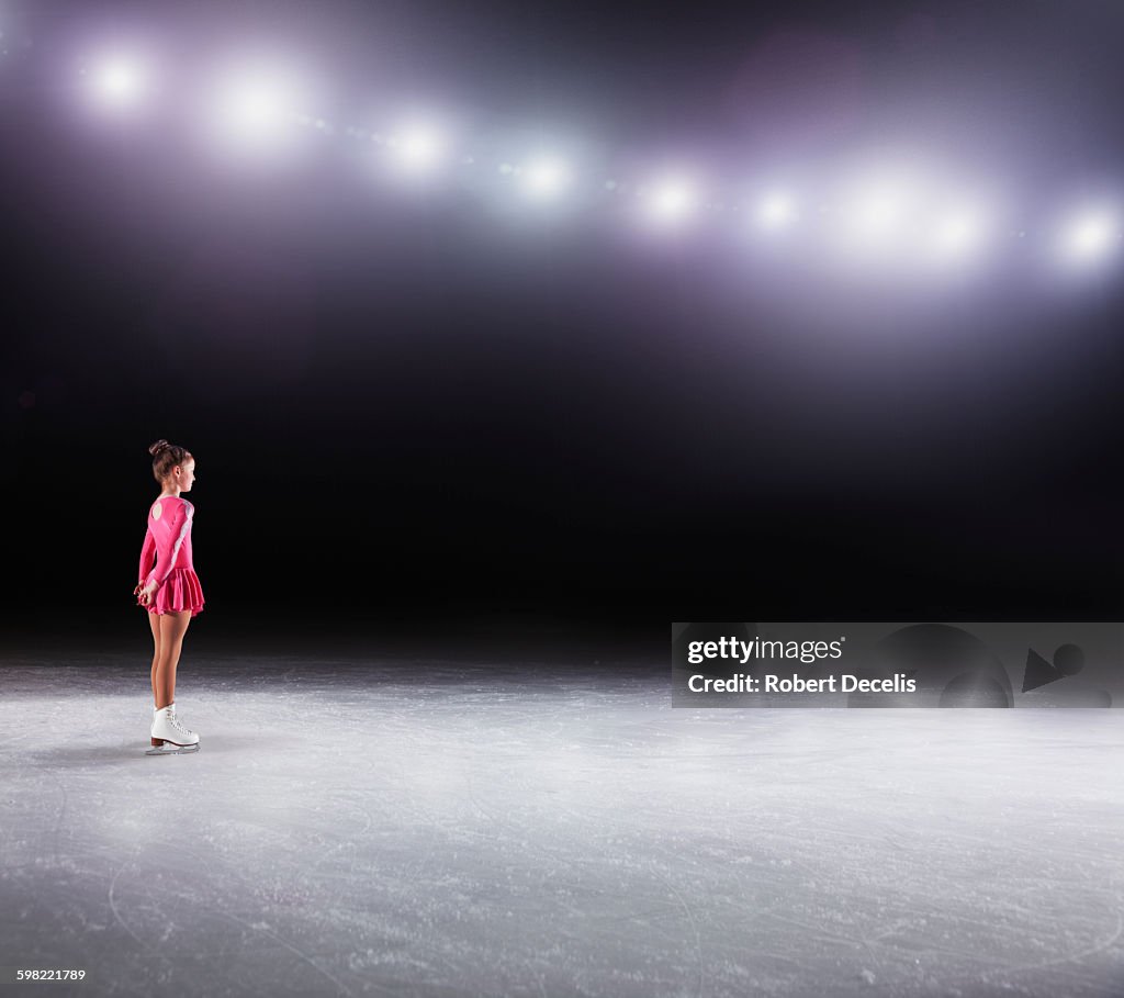 Young figure skater about to perform