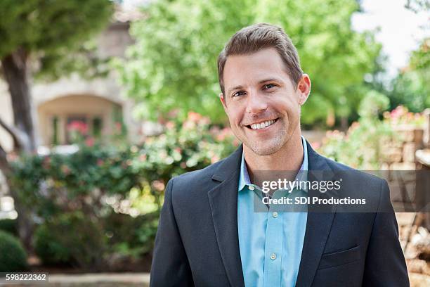 handsome young businessman - white jacket stock pictures, royalty-free photos & images