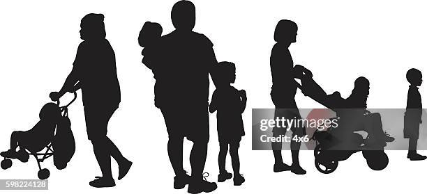 mother carrying baby stroller - mother holding baby silhouette stock illustrations