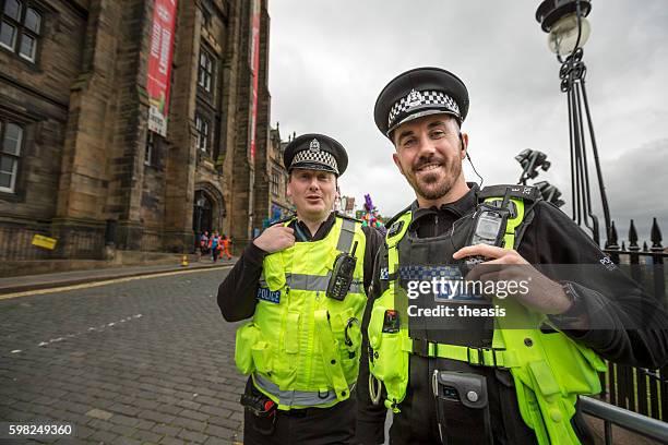 polizei auf der jazz and blues festival parade, edinburgh - uk police stock-fotos und bilder