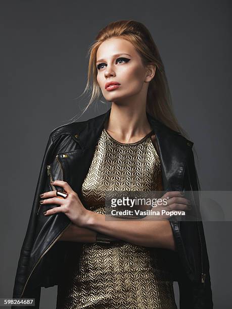 beautiful woman wearing leather jacket - black eyeshadow stock pictures, royalty-free photos & images