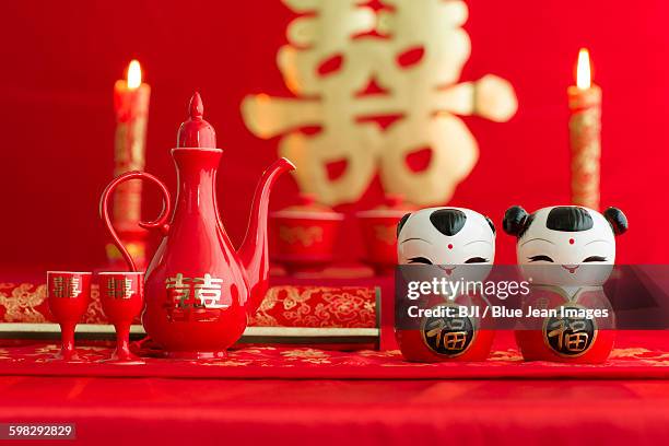 traditional chinese wedding elements - chinese dolls stock pictures, royalty-free photos & images