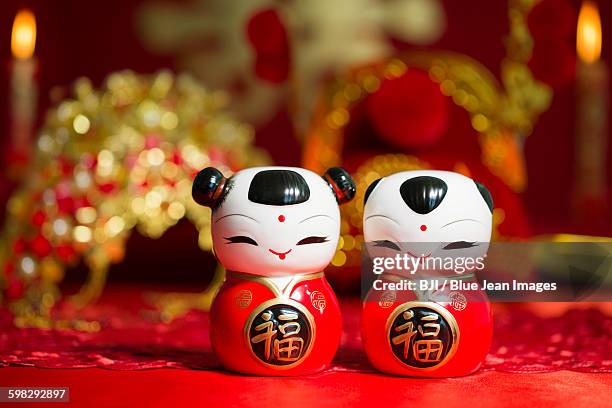 traditional chinese wedding elements - chinese dolls stock pictures, royalty-free photos & images