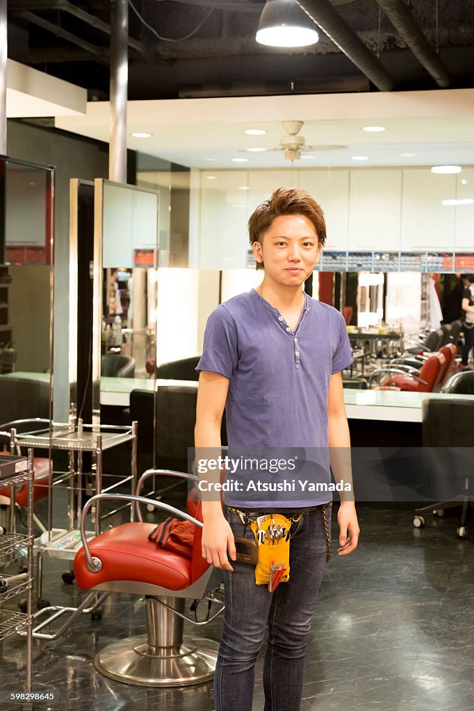 Young hairdressers in salon