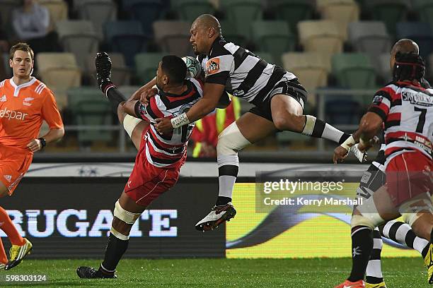 Jimmy Tupou of Counties Manukau and Robbie Fruean of Hawke's Bay contest a high ball during the round three Mitre 10 Cup match between Hawke's bay...