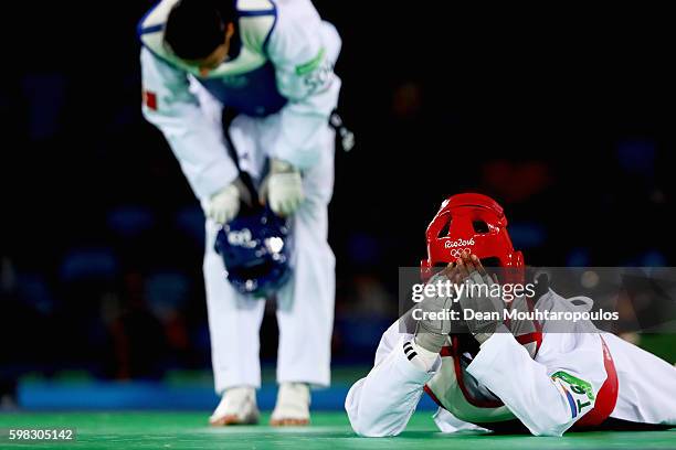 Haby Niare of France celebrates victory against Nur Tatar of Turkey after they compete in their Women's -67kg Taekwondo semifinal bout on Day 14 of...