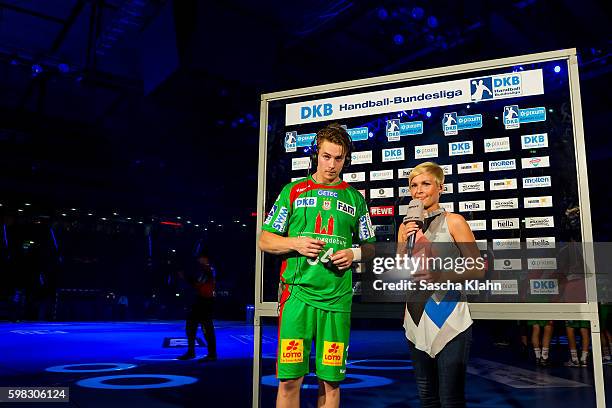 Anett Sattler of Sport1 talking to Michael Damgaard at the Pixum Super Cup 2016 between Rhein-Neckar Lwen and SC Magdeburg at Porsche Arena on August...