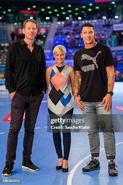 Markus Goetz, Anett Sattler and Stefan Kretzschmar of Sport1 at the Pixum Super Cup 2016 between Rhein-Neckar Lwen and SC Magdeburg at Porsche Arena...