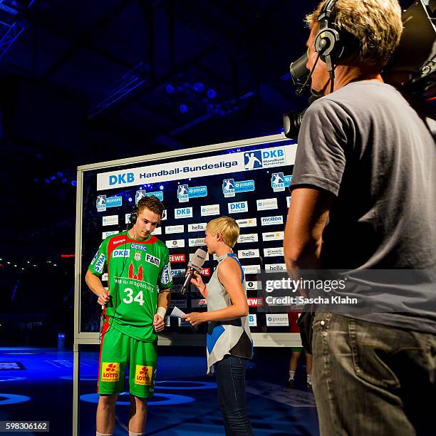 Anett Sattler of Sport1 talking to Michael Damgaard at the Pixum Super Cup 2016 between Rhein-Neckar Lwen and SC Magdeburg at Porsche Arena on August...