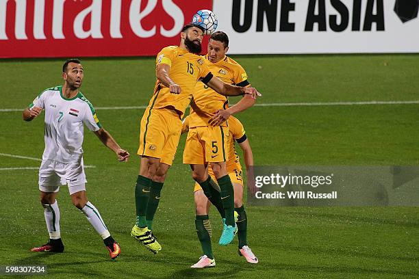Mile Jedinak of Australia heads the ball during the 2018 FIFA World Cup Qualifier match between the Australian Socceroos and Iraq at nib Stadium on...