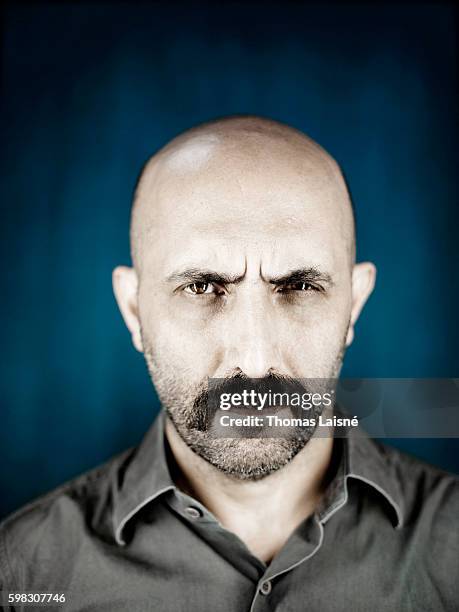 Director Gaspar Noe is photographed for Self Assignment on April 12, 2010 in Paris, France.