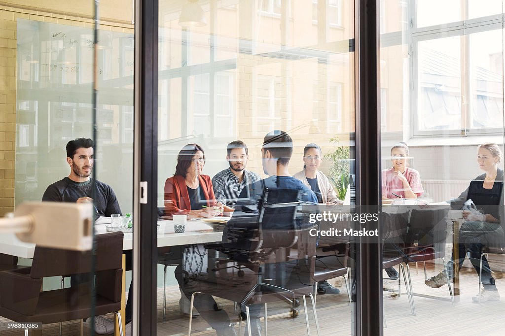 Multi-ethnic business people having discussion in conference room