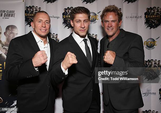 Georges St-Pierre, Alain Moussi and Michael Dudikoff attend the premiere Of RLJ Entertainment's "Kickboxer: Vengeance" at iPic Theaters on August 31,...