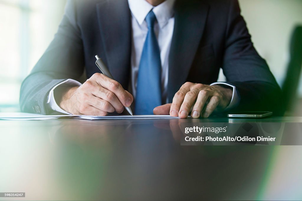 Businessman doing paperwork