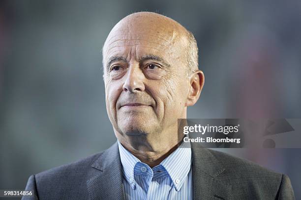 Alain Juppe, former French prime minister, looks on during the MEDEF business conference in Jouy-en-Josas, France, on Wednesday, Aug. 31, 2016. The...