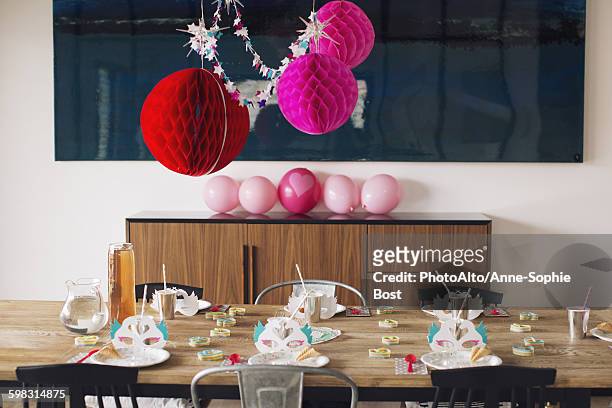 festive birthday party decorations - draped table stock pictures, royalty-free photos & images