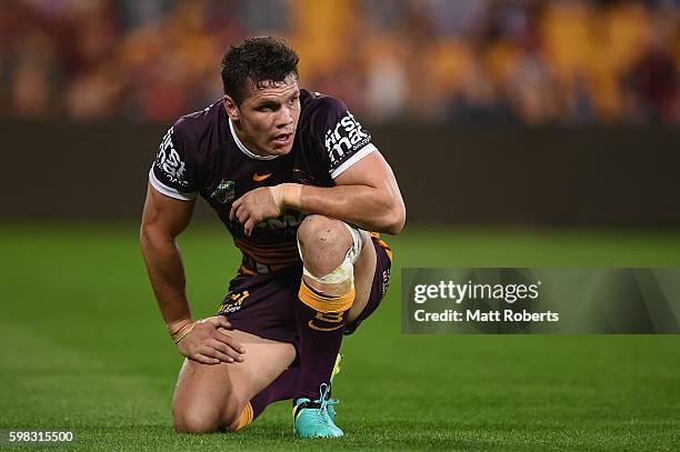 James Roberts of the Broncos looks dejected during the round 26 NRL match between the Brisbane Broncos and the Sydney Roosters at Suncorp Stadium on...