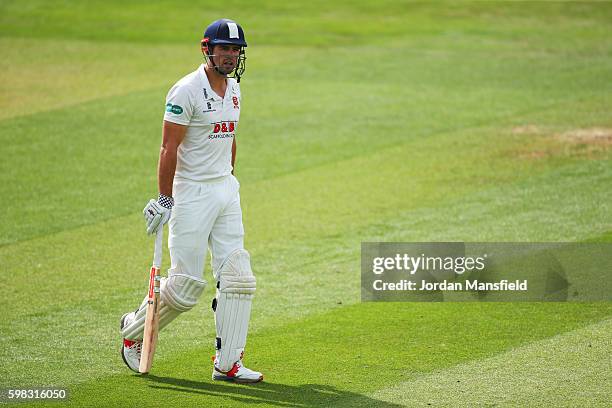 Alastair Cook of Essex walks off the field after being caught out by Ross Whiteley of Worcestershire bowled Ed Barnard of Worcestershire during day...