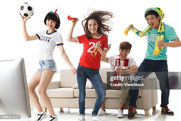 young fans watching the game cheering - china fans cheer stock pictures, royalty-free photos & images