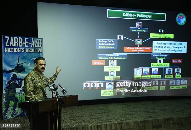 Pakistani Army Spokesman Lieutenant General Asim Saleem Bajwa holds a press conference at the Building Inter Services Public Relations in Rawalpindi,...