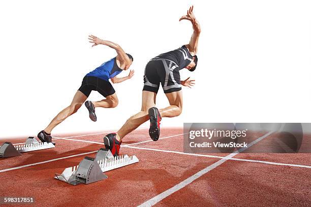 track and field athletes running - indoor track and field stock pictures, royalty-free photos & images