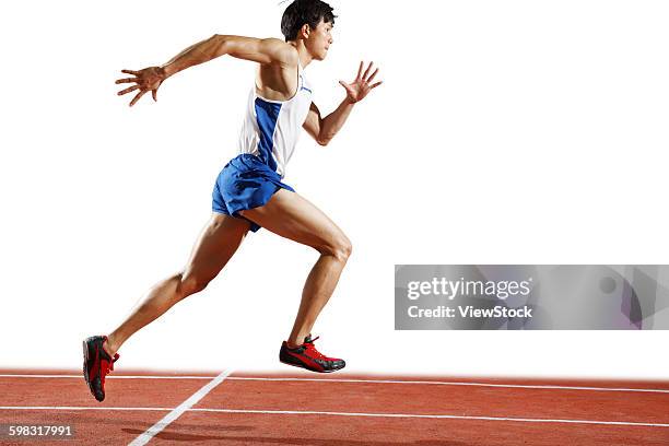 track and field athletes running - indoor track and field stock pictures, royalty-free photos & images