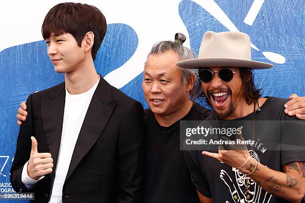 Actor Lee Won-gun, director Kim Ki-duk and actor Ryoo Seung-Bum attend a photocall for 'Geumul - The Net' during the 73rd Venice Film Festival at on...