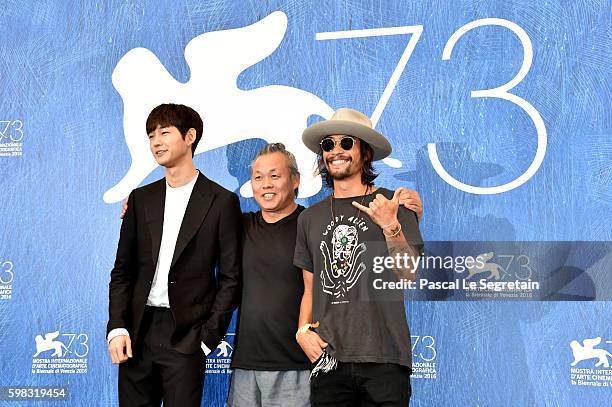 Actor Lee Won-gun, director Kim Ki-duk and actor Ryoo Seung-Bum attend a photocall for 'Geumul - The Net' during the 73rd Venice Film Festival at on...